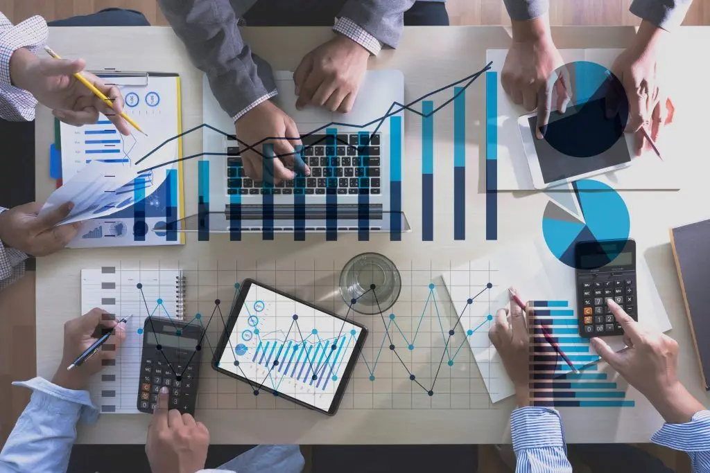 Project manager with a Gantt chart or team looking at a timeline